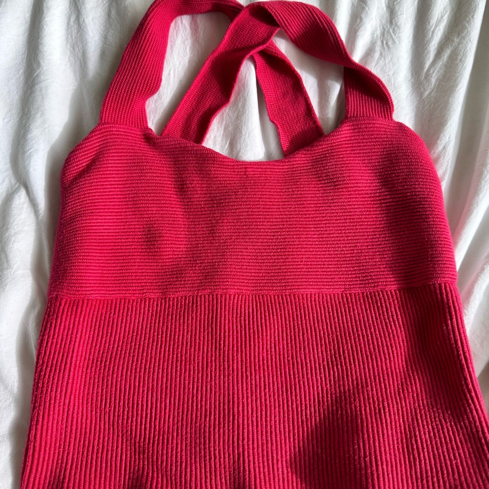 Abercrombie and Fetch pink top, please view picture for more. Sizing is M.